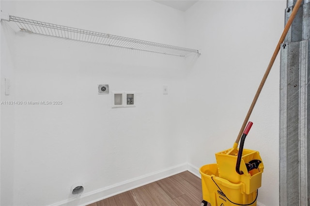 12254 SW 217th St, Miami, FL 33170 - washroom featuring washer hookup, electric dryer hookup, and wood finished floors