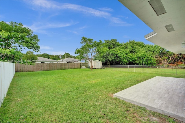 12254 SW 217th St, Miami, FL 33170 - fenced backyard with a patio area and a shed