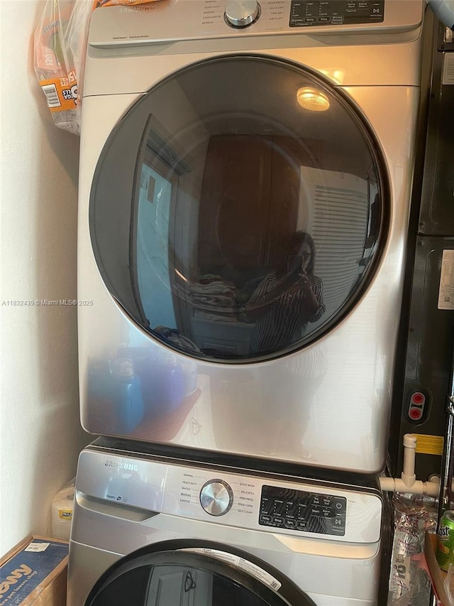 8312 NW 59th St, Tamarac, FL 33321 - laundry room with stacked washer and clothes dryer