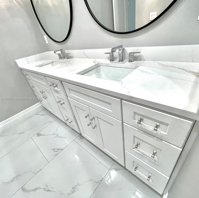1013 SW Deauville Ave, Port St Lucie, FL 34953 - full bath with marble finish flooring and double vanity