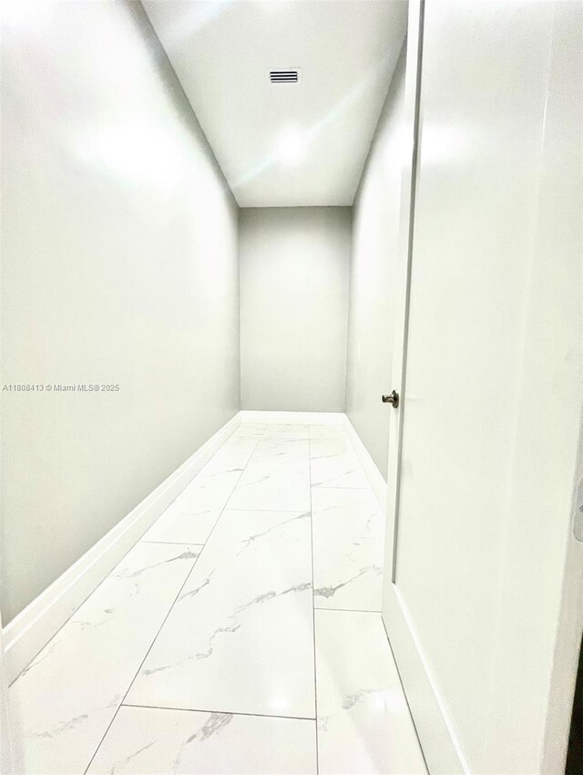 1013 SW Deauville Ave, Port St Lucie, FL 34953 - hall with marble finish floors