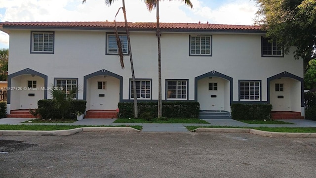 972 N 18th Ct, Hollywood, FL 33020 - view of front of house featuring a tiled roof and stucco siding
