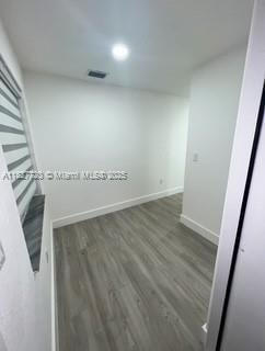 972 N 18th Ct, Hollywood, FL 33020 - empty room featuring wood finished floors and recessed lighting