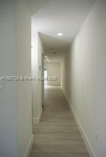 972 N 18th Ct, Hollywood, FL 33020 - corridor featuring baseboards and wood finished floors