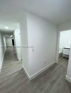 972 N 18th Ct, Hollywood, FL 33020 - corridor featuring baseboards and wood finished floors