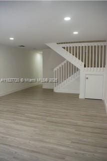 972 N 18th Ct, Hollywood, FL 33020 - empty room with wood finished floors and recessed lighting