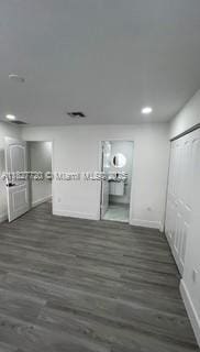 972 N 18th Ct, Hollywood, FL 33020 - unfurnished room featuring dark wood-style floors and recessed lighting