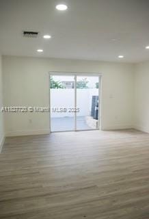 972 N 18th Ct, Hollywood, FL 33020 - spare room with wood finished floors and recessed lighting
