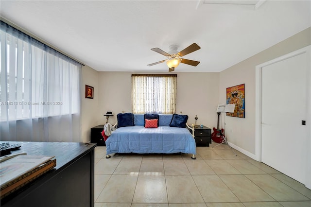 1315 W 79th St, Hialeah, FL 33014 - bedroom featuring light tile patterned floors and a ceiling fan