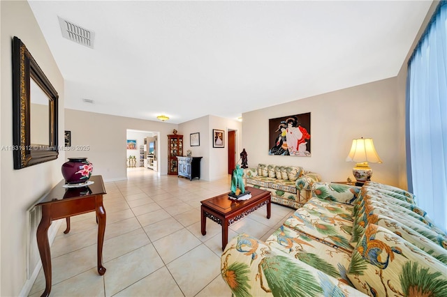 1315 W 79th St, Hialeah, FL 33014 - living area with light tile patterned flooring and baseboards