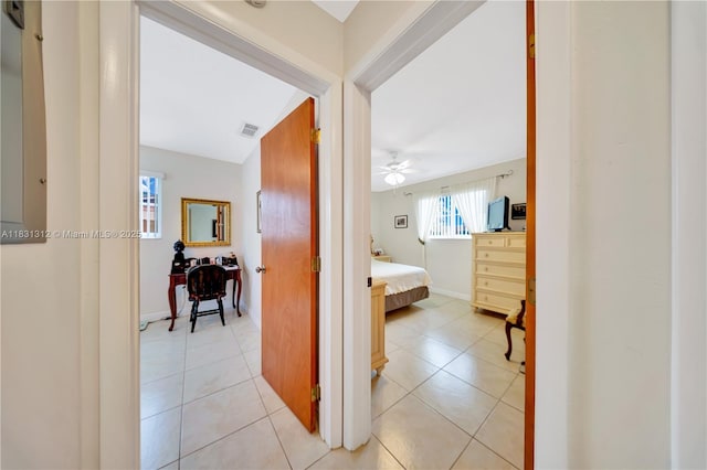 1315 W 79th St, Hialeah, FL 33014 - corridor featuring light tile patterned flooring