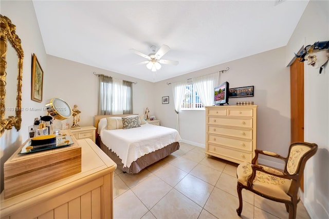 1315 W 79th St, Hialeah, FL 33014 - bedroom with light tile patterned flooring and a ceiling fan