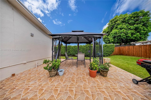 1315 W 79th St, Hialeah, FL 33014 - fenced backyard featuring a gazebo and a patio
