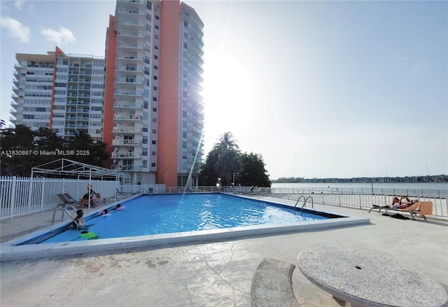 1351 NE Miami Gardens Dr Unit 513E, Miami, FL 33179 - community pool featuring a patio area