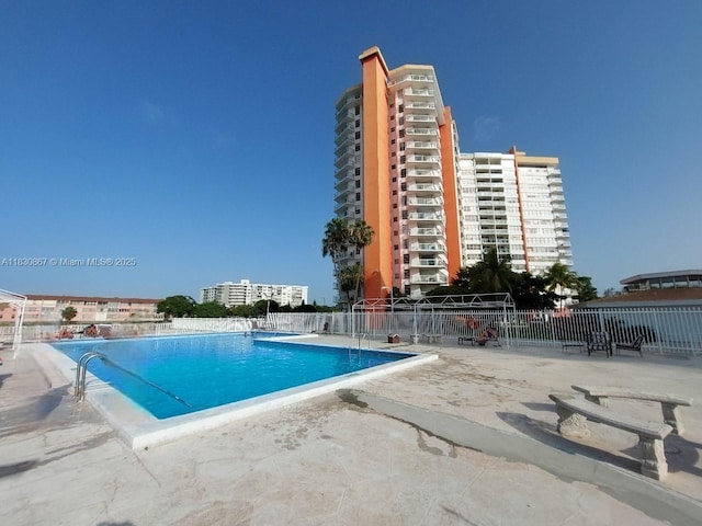 1351 NE Miami Gardens Dr Unit 513E, Miami, FL 33179 - community pool featuring a patio