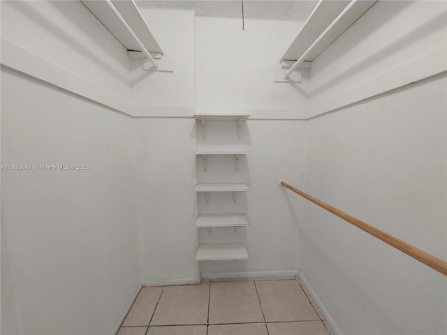 1351 NE Miami Gardens Dr Unit 513E, Miami, FL 33179 - spacious closet with light tile patterned floors