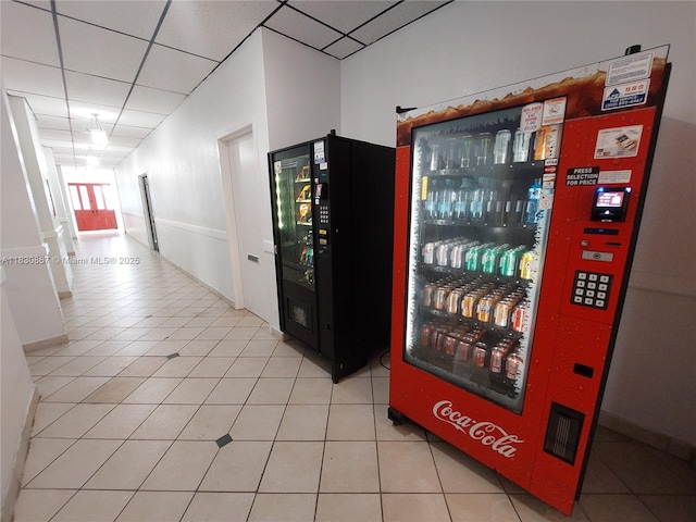 1351 NE Miami Gardens Dr Unit 513E, Miami, FL 33179 - corridor featuring light tile patterned flooring and a drop ceiling