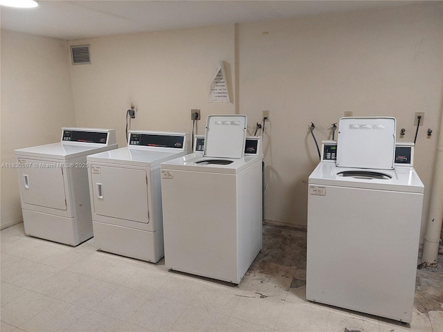 1351 NE Miami Gardens Dr Unit 513E, Miami, FL 33179 - community laundry featuring separate washer and dryer