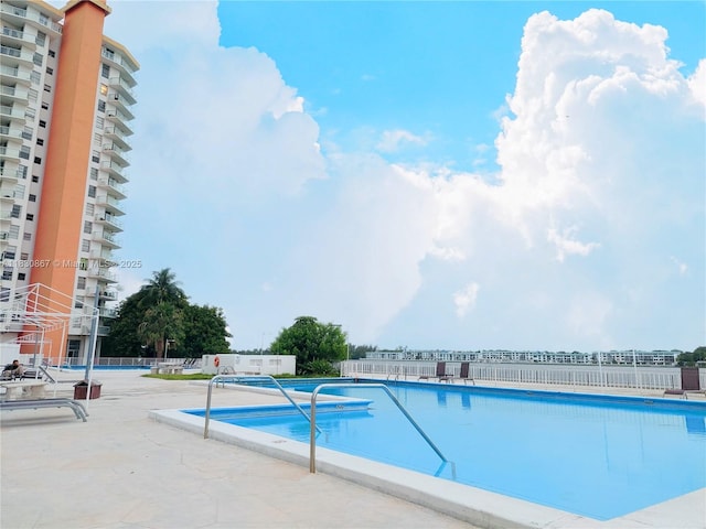 1351 NE Miami Gardens Dr Unit 513E, Miami, FL 33179 - community pool featuring a patio