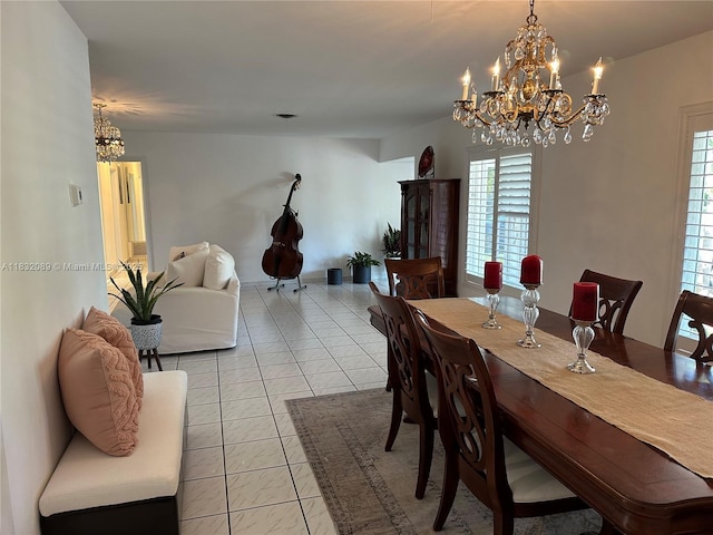 8821 SW 87th St, Miami, FL 33173 - dining space with a chandelier and light tile patterned floors
