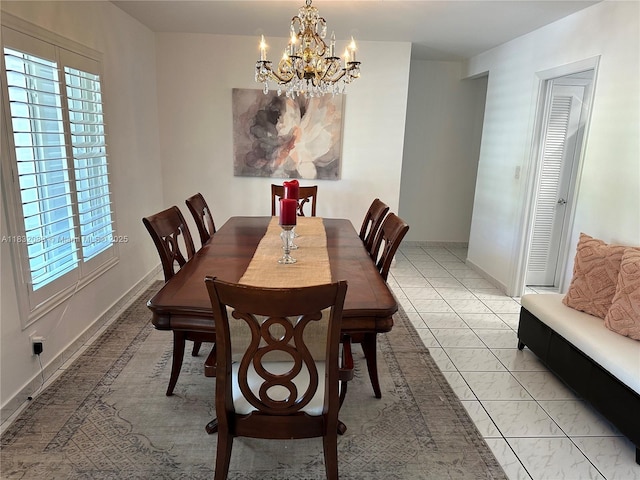 8821 SW 87th St, Miami, FL 33173 - dining space featuring a chandelier and healthy amount of natural light