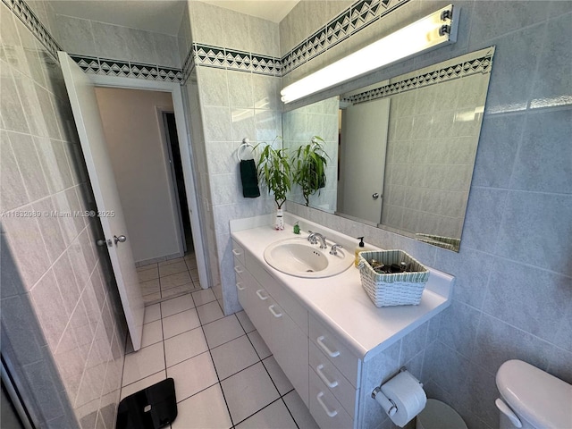 8821 SW 87th St, Miami, FL 33173 - bathroom featuring tile walls, tile patterned flooring, and vanity