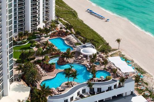 18001 Collins Ave Unit 1107, Sunny Isles Beach, FL 33160 - bird's eye view of a pool and unending shoreline