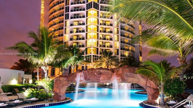 18001 Collins Ave Unit 1107, Sunny Isles Beach, FL 33160 - pool at twilight featuring a community pool