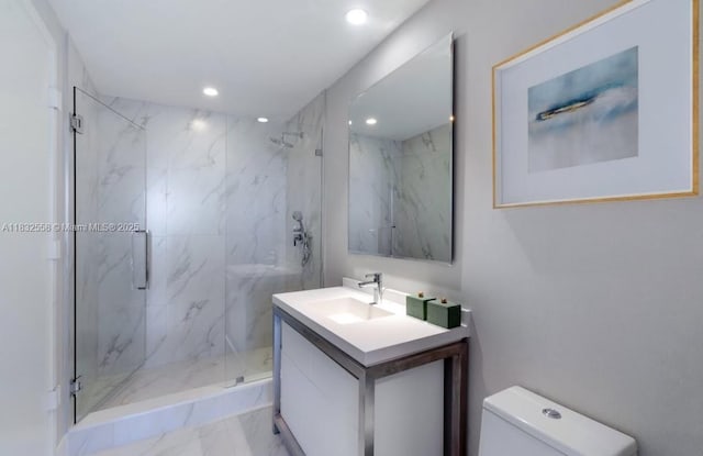 2000 Metropica Way Unit 2102, Sunrise, FL 33323 - bathroom featuring marble finish floors, a marble finish shower, vanity, and recessed lighting