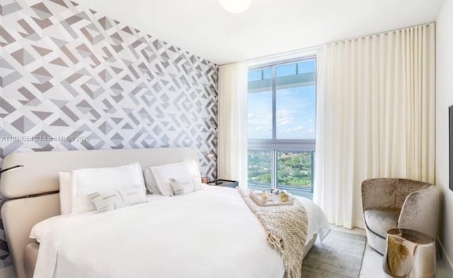 2000 Metropica Way Unit 2102, Sunrise, FL 33323 - bedroom with wallpapered walls