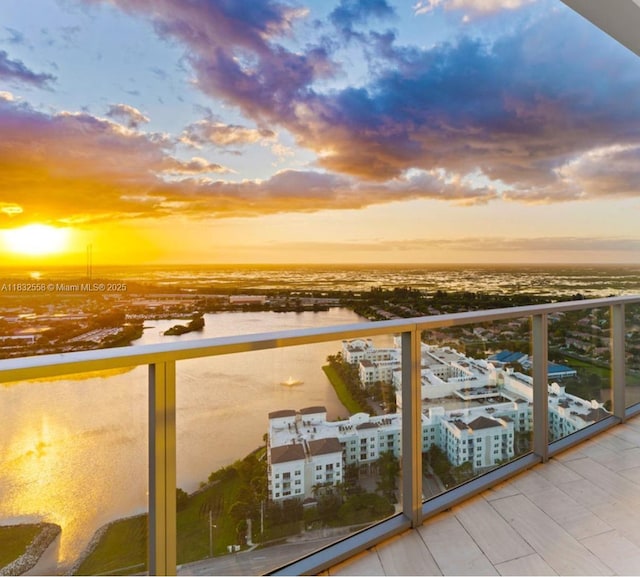 2000 Metropica Way Unit 2102, Sunrise, FL 33323 - balcony at dusk with a water view