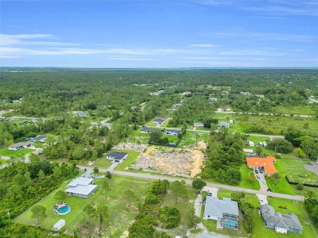 1018 Calvin Ave, Lehigh Acres, FL 33972 - view of property location with a forest