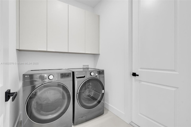 1018 Calvin Ave, Lehigh Acres, FL 33972 - washroom featuring washing machine and dryer and cabinet space