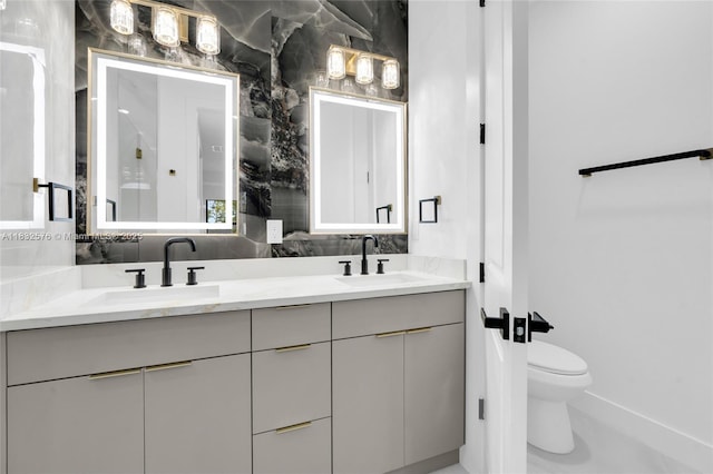 1018 Calvin Ave, Lehigh Acres, FL 33972 - full bathroom featuring double vanity and toilet