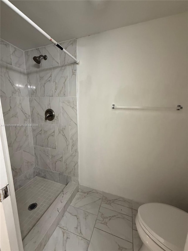 6515 W 27th Ct Unit 49-12, Hialeah, FL 33016 - bathroom with marble look tiles and a stall shower