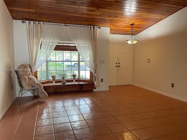 14409 SW 141st Pl, Miami, FL 33186 - tiled foyer with wood ceiling and baseboards