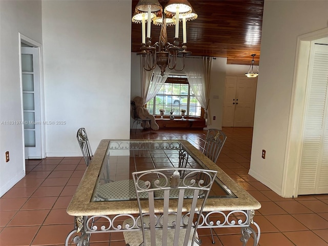 14409 SW 141st Pl, Miami, FL 33186 - tiled dining area with a chandelier and wooden ceiling