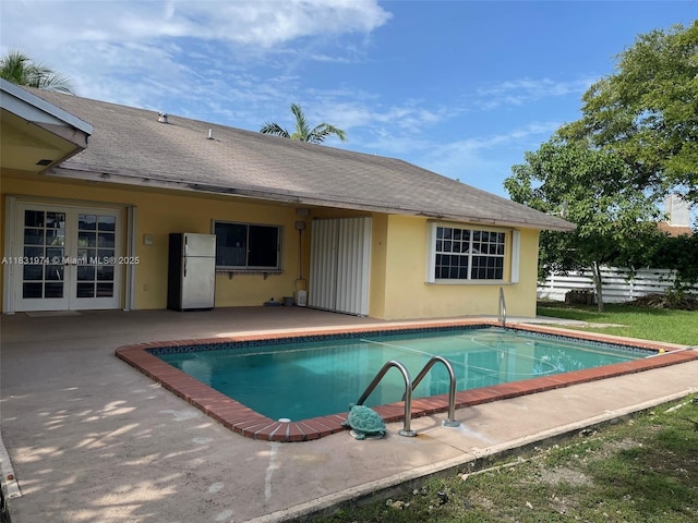 14409 SW 141st Pl, Miami, FL 33186 - view of pool with a patio area and french doors