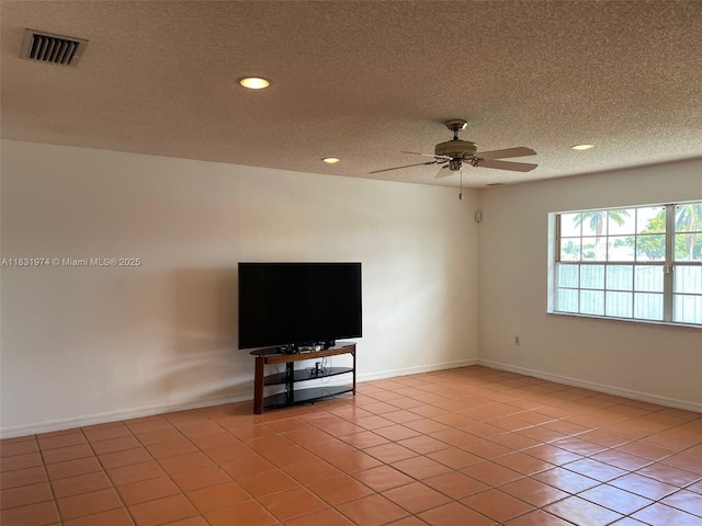 14409 SW 141st Pl, Miami, FL 33186 - unfurnished living room with a ceiling fan, light tile patterned floors, a textured ceiling, and recessed lighting