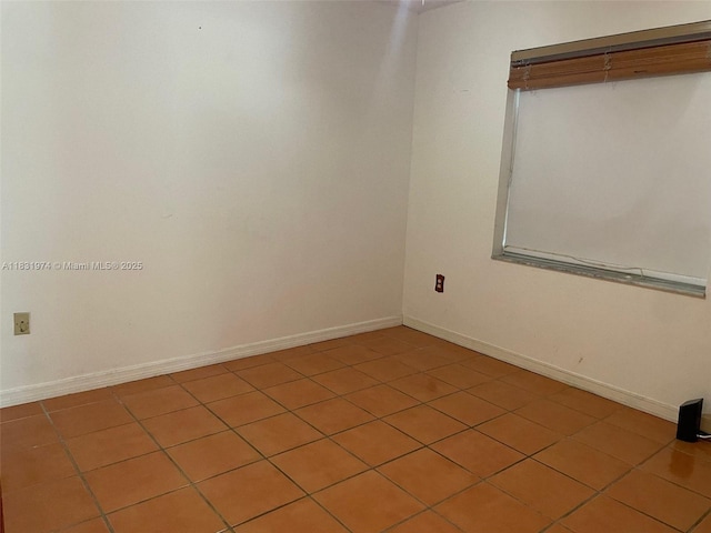 14409 SW 141st Pl, Miami, FL 33186 - unfurnished room with tile patterned floors and baseboards