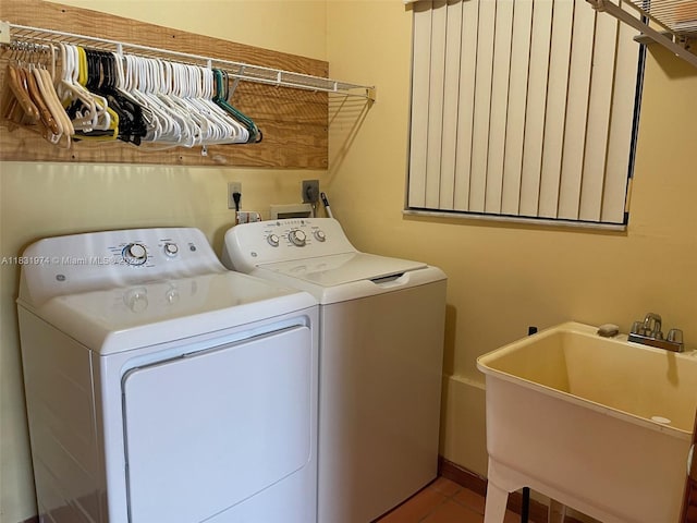14409 SW 141st Pl, Miami, FL 33186 - laundry room with washing machine and clothes dryer and tile patterned floors