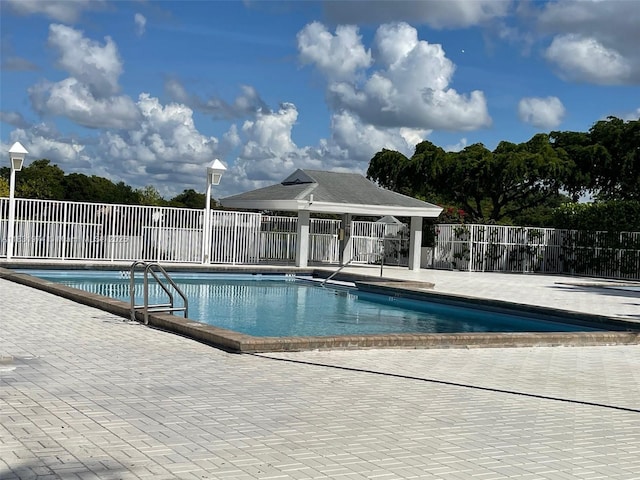14409 SW 141st Pl, Miami, FL 33186 - community pool with a patio