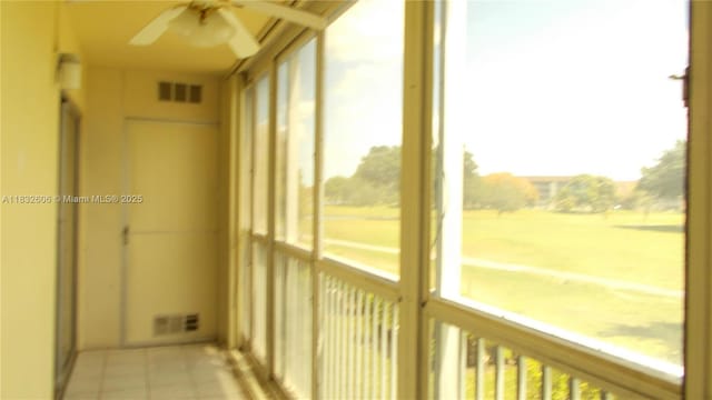 13550 SW 6th Ct Unit 208A, Pembroke Pines, FL 33027 - unfurnished sunroom featuring tile patterned flooring