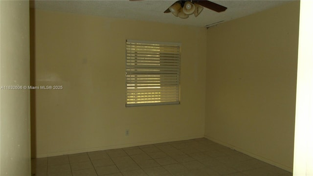 13550 SW 6th Ct Unit 208A, Pembroke Pines, FL 33027 - tiled spare room with a ceiling fan and baseboards