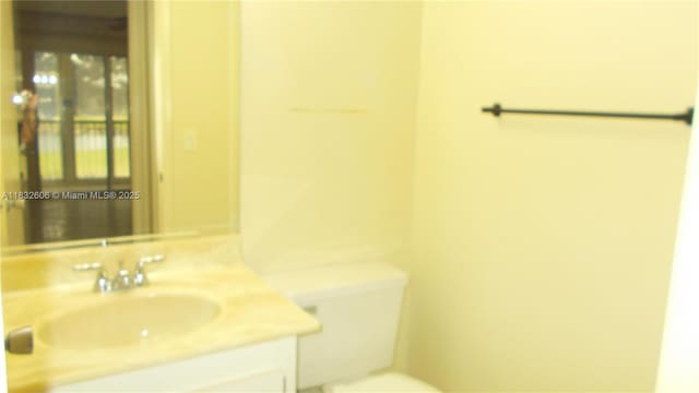 13550 SW 6th Ct Unit 208A, Pembroke Pines, FL 33027 - half bath with vanity and toilet