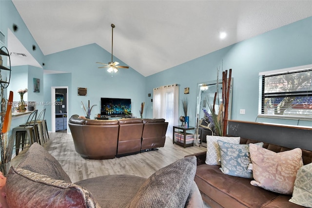 1419 Avon Ln Unit 216, North Lauderdale, FL 33068 - living area with ceiling fan, wood finished floors, and high vaulted ceiling
