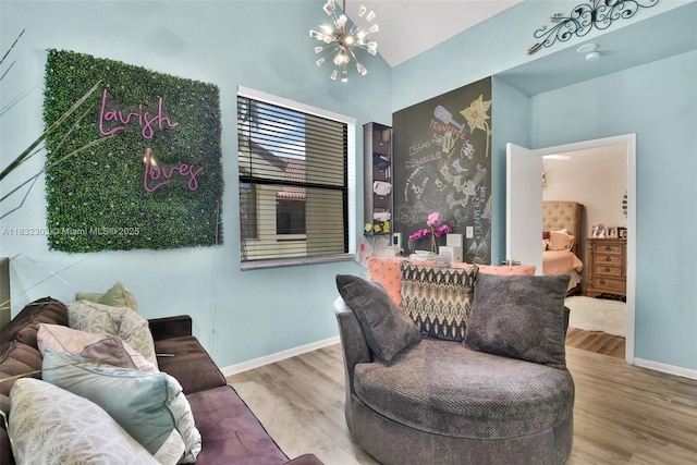 1419 Avon Ln Unit 216, North Lauderdale, FL 33068 - living room featuring wood finished floors and vaulted ceiling