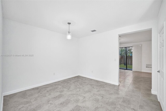 5013 Vulcan Way, Davie, FL 33314 - empty room with baseboards and light tile patterned floors