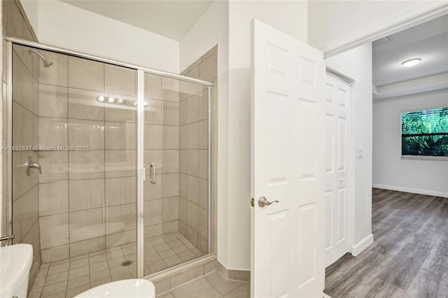 5013 Vulcan Way, Davie, FL 33314 - bathroom featuring a stall shower and wood finished floors