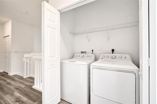 5013 Vulcan Way, Davie, FL 33314 - washroom with washing machine and dryer and wood finished floors